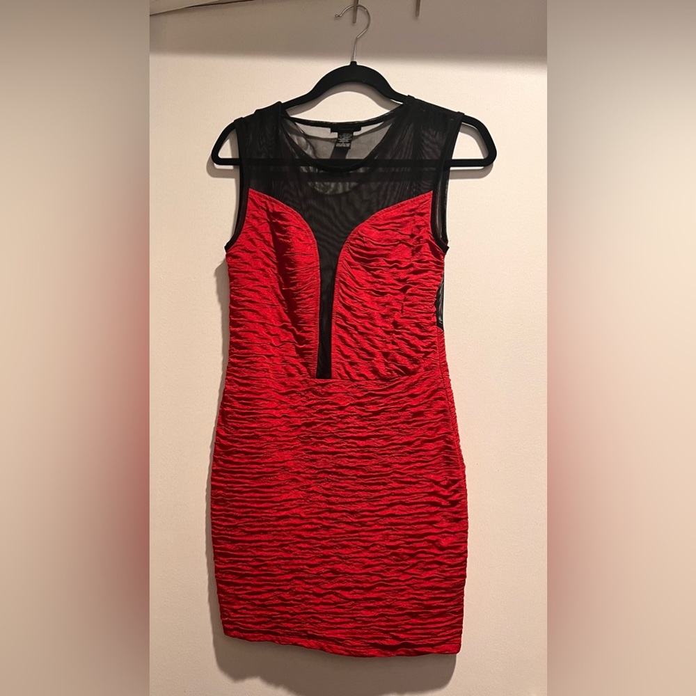 Red dress with black mesh! Perfect for the upcoming holiday season.